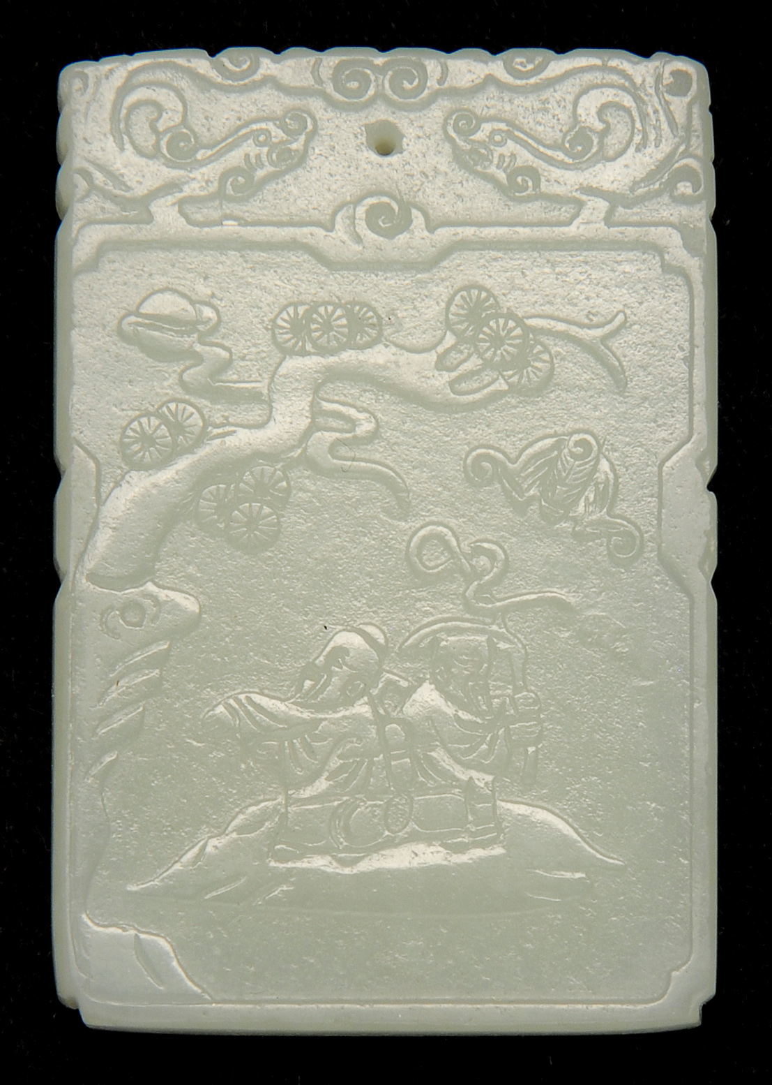 Appraisal: PALE CELADON JADE PENDANT In rectangular form Carved on one