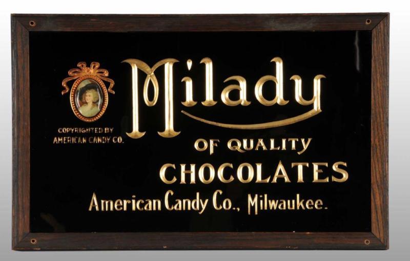 Appraisal: Reverse-on-Glass Milady Chocolates Sign Description Milwaukee WI Circa Original frame