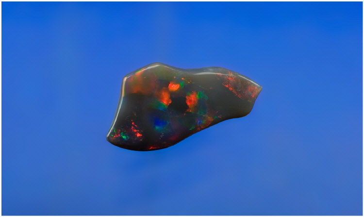 Appraisal: Large Carat Lightning Ridge Opal Measures x cm Predominantly red