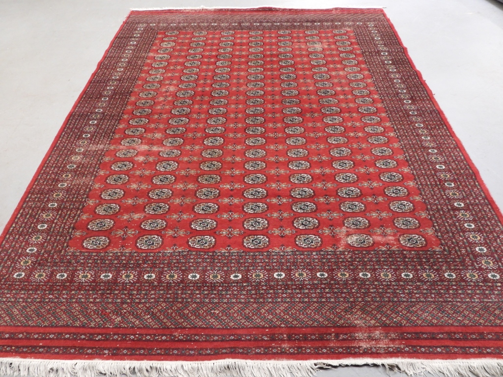 Appraisal: BOKHARA HAND KNOTTED CARPET RUG Persia nd half th centuryRepeating