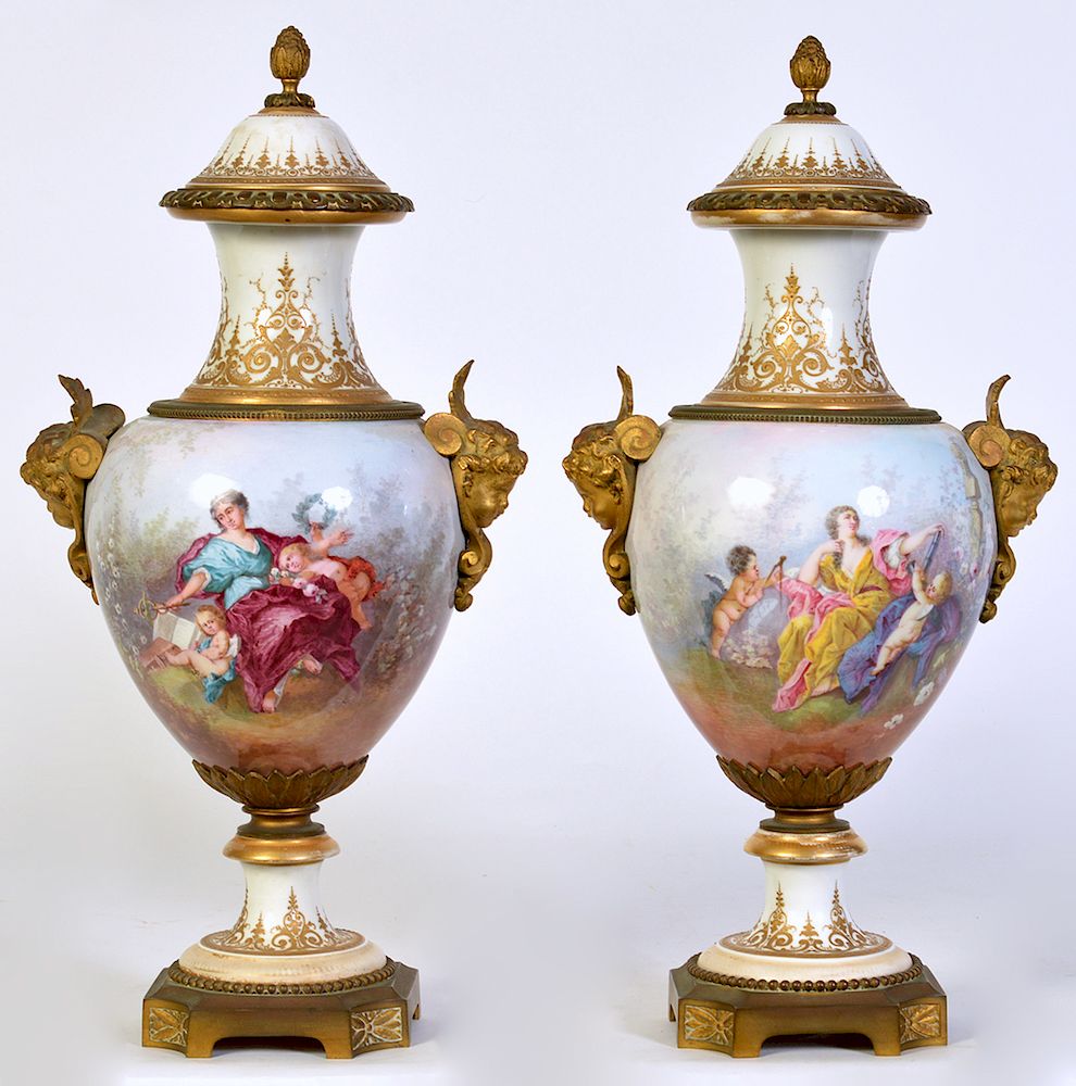 Appraisal: Pr Bronze Mounted Lidded Sevres Style Urns Pair of Sevres