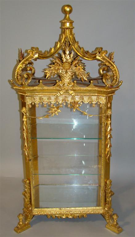 Appraisal: EUROPEAN CLASSICAL STYLE GILT VITRINE re-gilt in kt gold leaf