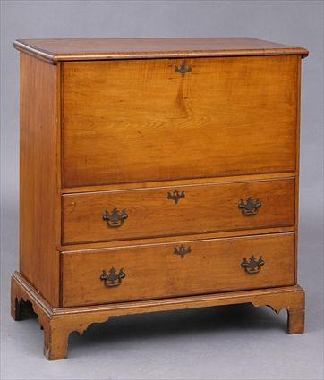 Appraisal: FEDERAL CHERRY AND FIGURED MAPLE BLANKET CHEST The hinged top