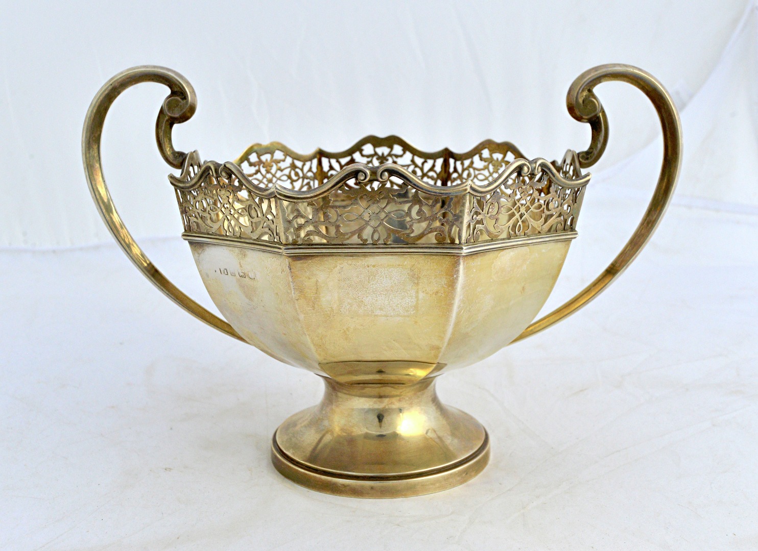 Appraisal: A silver octagonal twin handled bowl the top decorated with