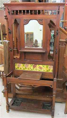 Appraisal: VICTORIAN WALNUT HALLSTAND English late th century the top half