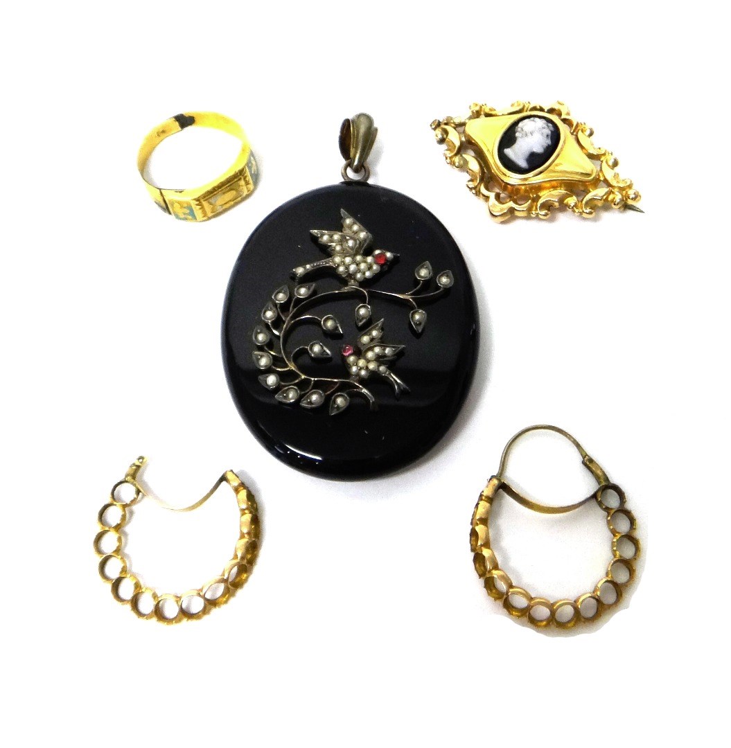 Appraisal: A seed pearl and red gem set mounted oval black