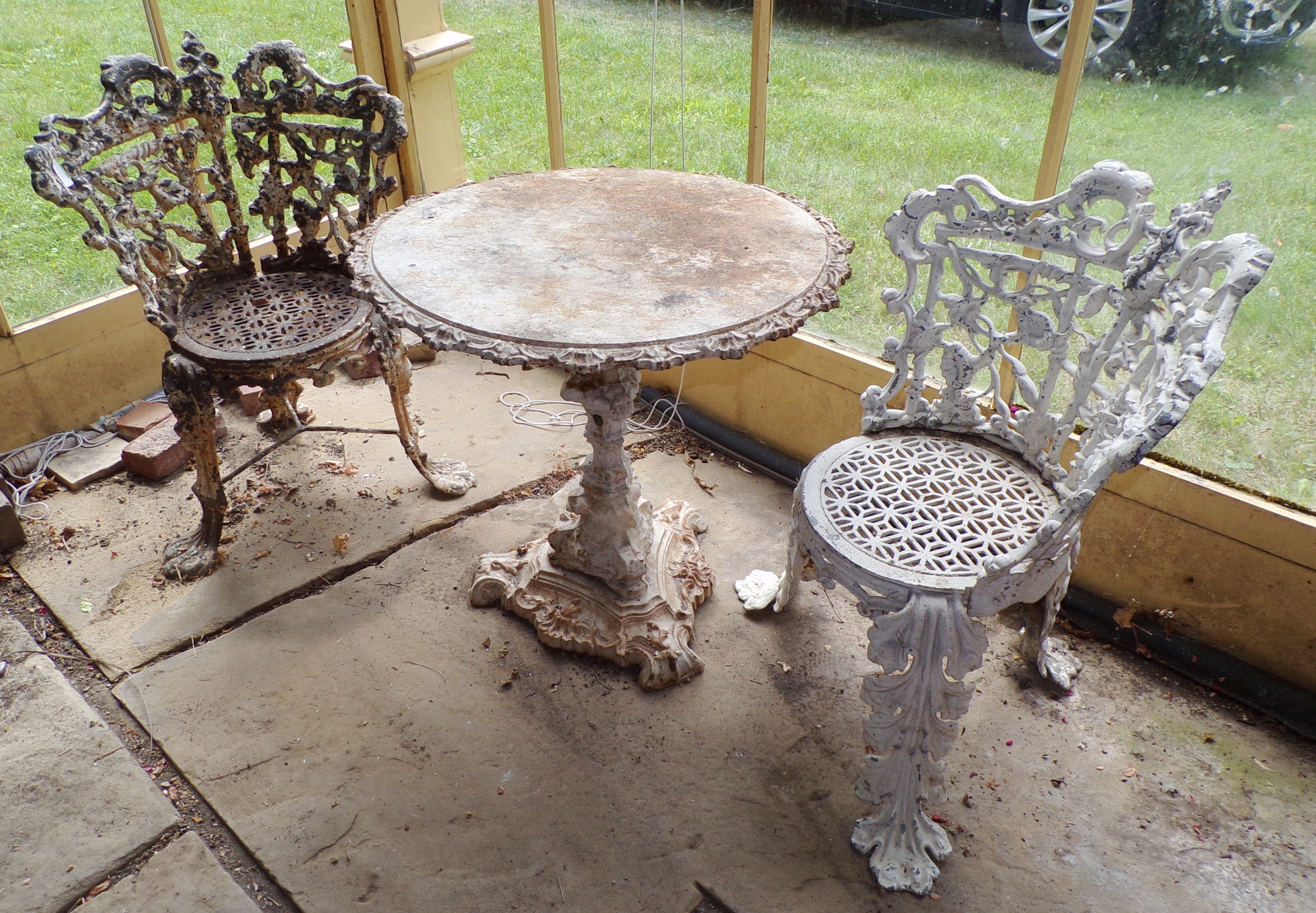 Appraisal: -Pc Wrought iron garden set- chairs and table Chairs ''