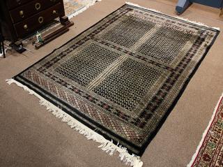 Appraisal: Pakistani Hatchli carpet ' x ' Pakistani Hatchli carpet '