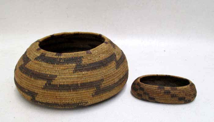 Appraisal: TWO POMO NATIVE AMERICAN COILED BASKETS the larger has brown