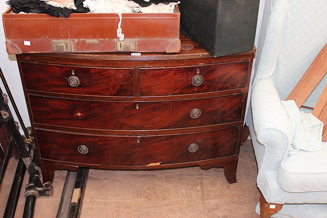 Appraisal: A VICTORIAN MAHOGANY BOW FRONTED CHEST OF TWO SHORT AND