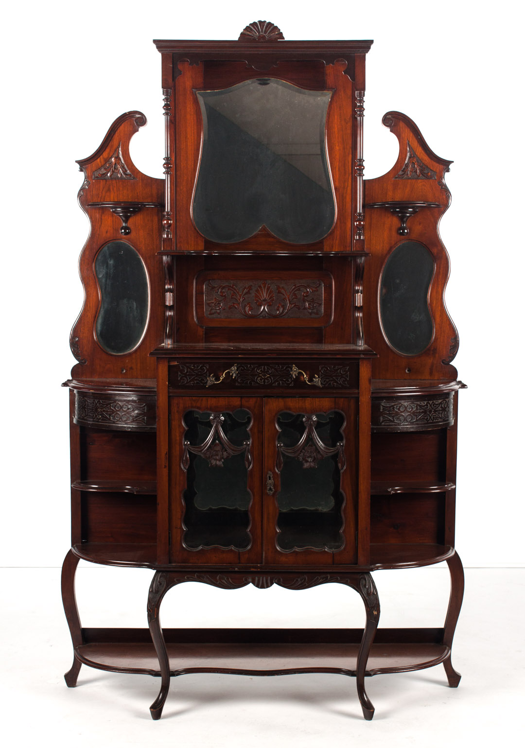 Appraisal: Edwardian mahogany etagere late th early th century raised mirrored