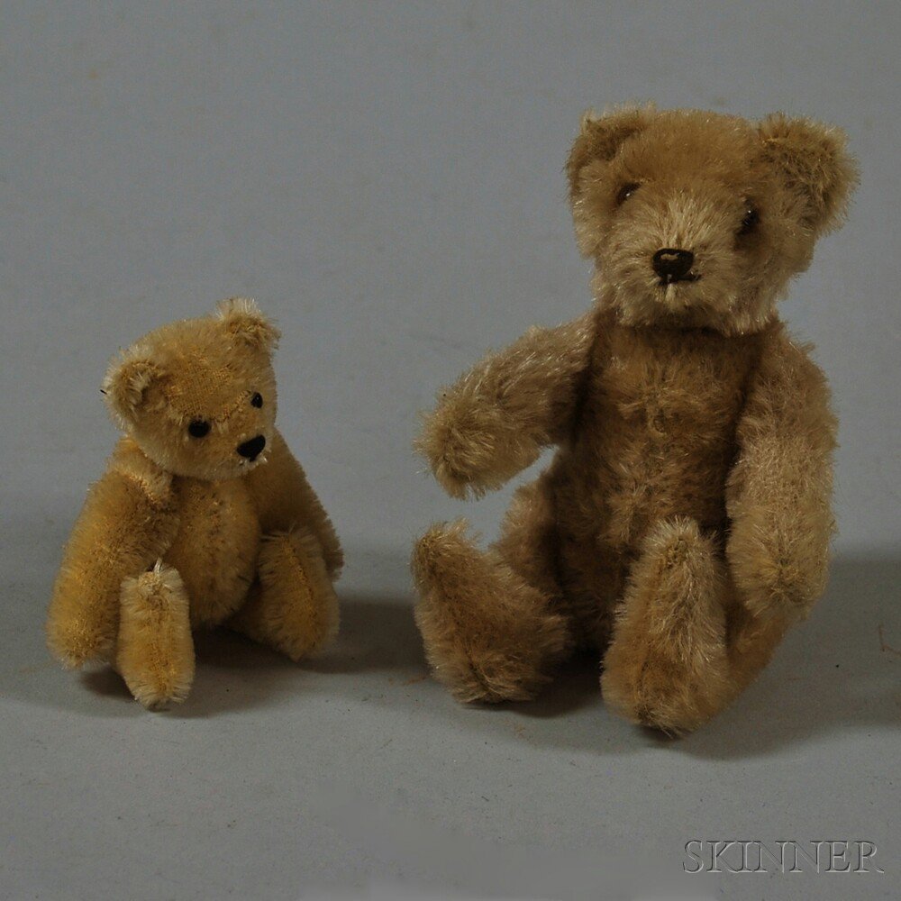 Appraisal: Two Miniature Articulated Mohair Teddy Bears a golden mohair with