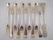 Appraisal: Eleven three pronged silver dessert forks George Smith London wt