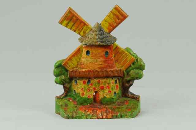 Appraisal: WINDMILL DOORSTOP windmill done in warm colors contrasted by surrounding