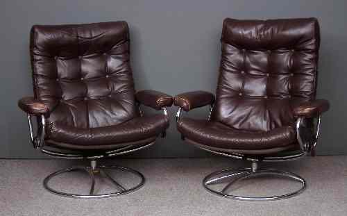 Appraisal: A pair of Norwegian chromed metal framed easy chairs upholstered