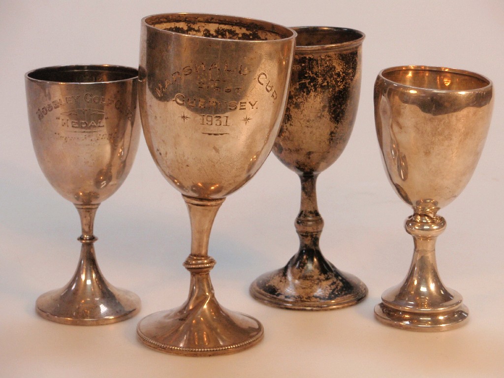 Appraisal: Four silver trophy cups various hallmarks and dates oz gross