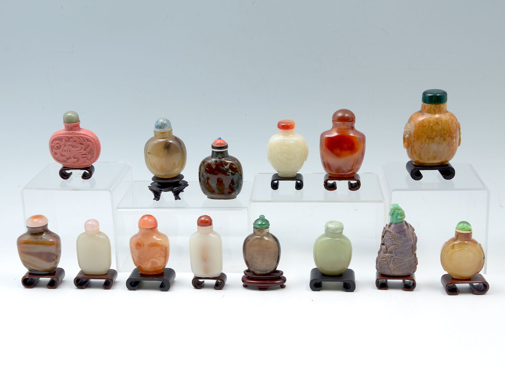 Appraisal: PC CHINESE JADE HARDSTONE SNUFF BOTTLE COLLECTION Comprising carved polished