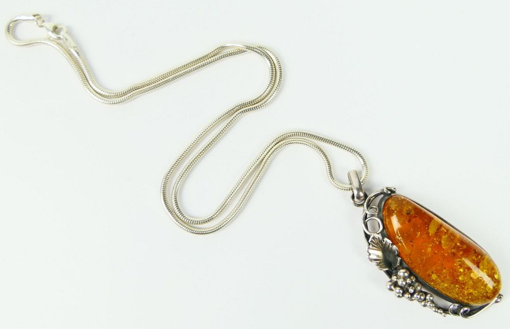 Appraisal: VINTAGE STERLING AND AMBER PENDENT NECKLACE Necklace chain measures long