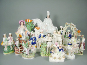 Appraisal: Twelve Staffordshire figures and groups to include a figure of