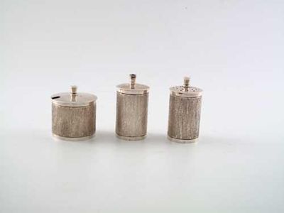 Appraisal: A modern piece cylindrical condiment set with textured sides the