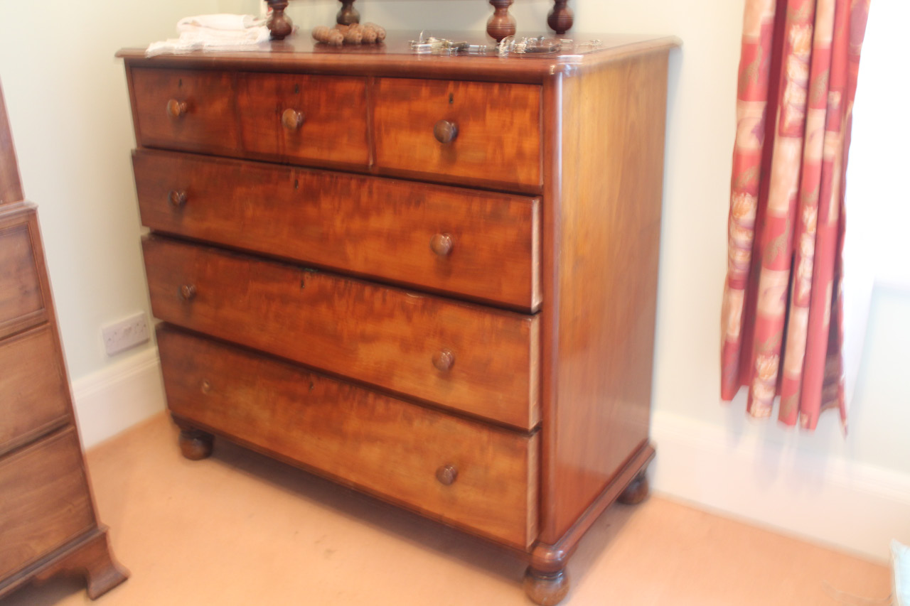 Appraisal: A Victorian mahogany chest of three short and three long