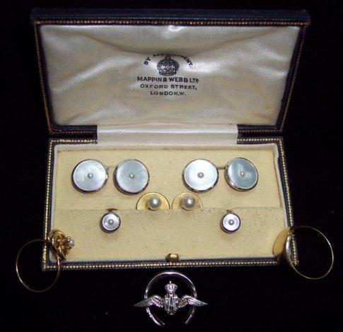 Appraisal: A gentleman's mother-of-pearl dressing set in a fitted Mappin and