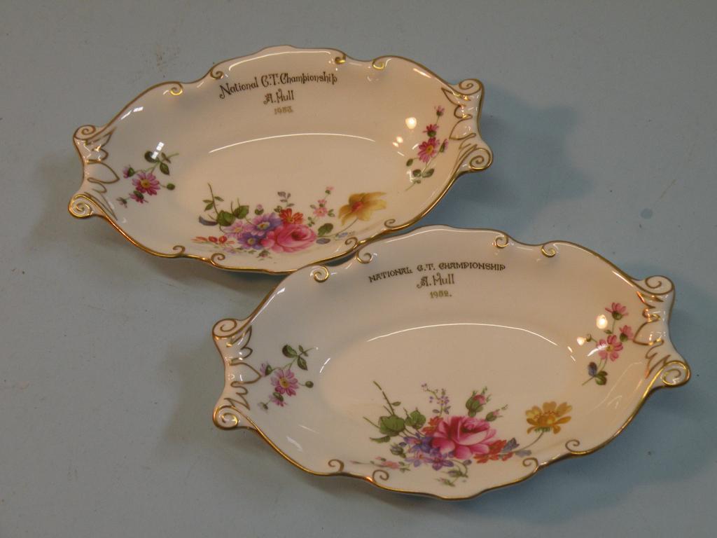 Appraisal: A pair of Royal Crown Derby Posies pattern two handled