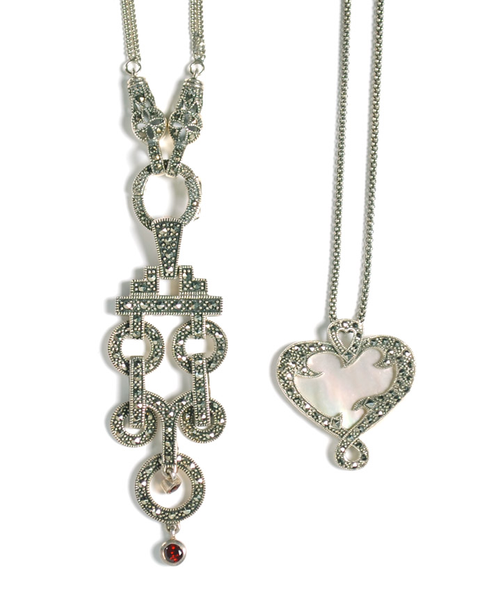 Appraisal: TWO MARCASITE NECKLACES the first of heart shape with mother