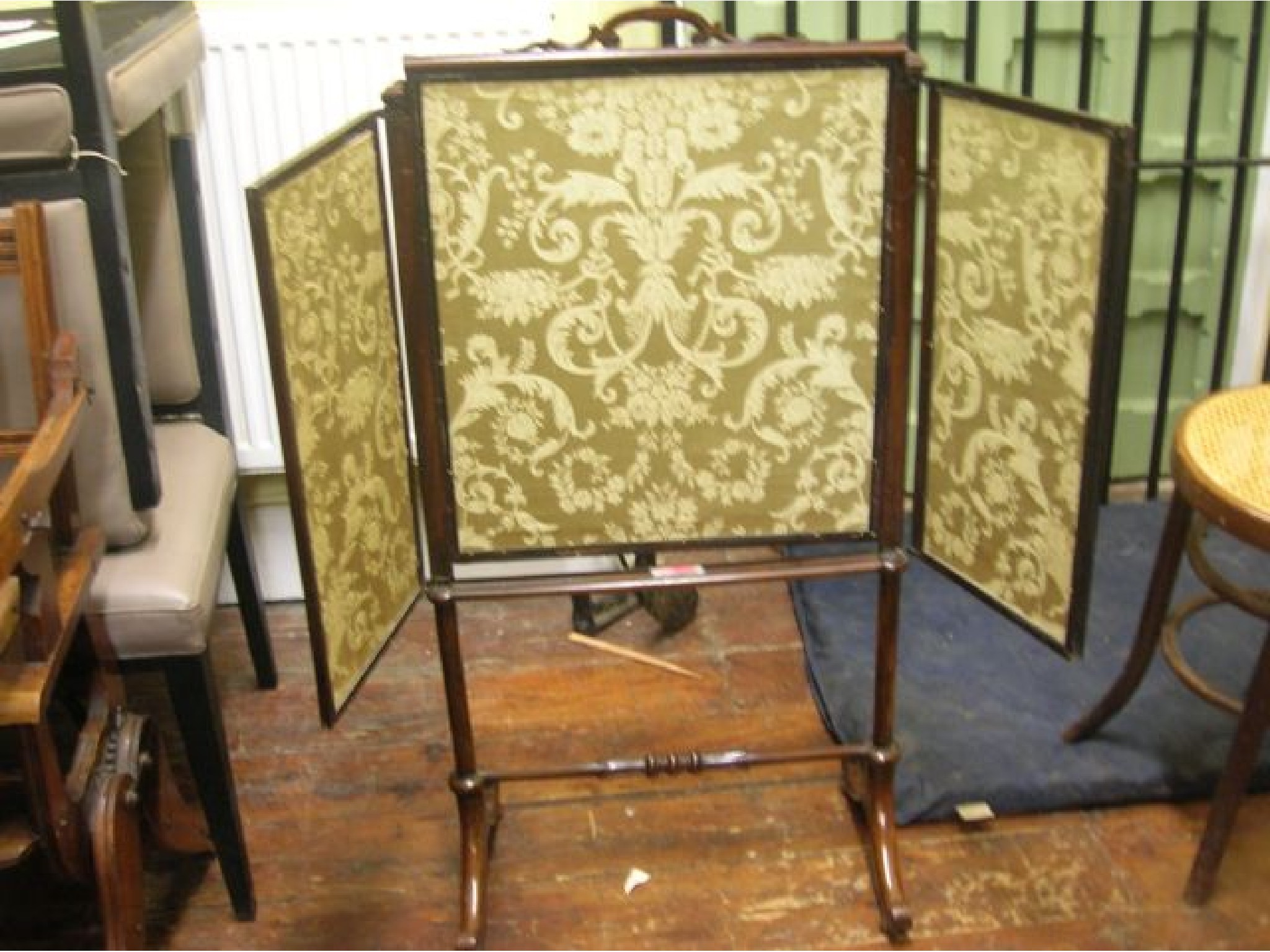 Appraisal: An early th century rose framed firescreen with hand worked