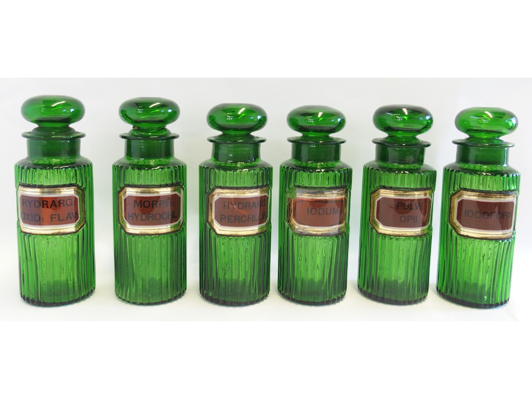 Appraisal: A set of six green glass apothecary jars