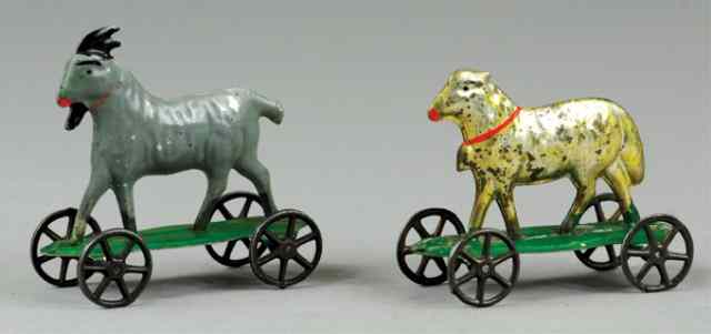 Appraisal: GOAT AND LAMB TIN PULL TOYS Lot of two small