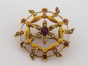 Appraisal: An early th century carat gold seed pearl and garnet