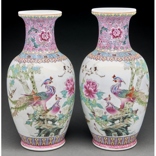 Appraisal: A pair of Chinese pink ground famille rose peafowl and