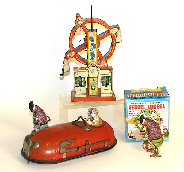 Appraisal: Carnival amusement themed toys Lithographed articulated toys includes Chein clowns