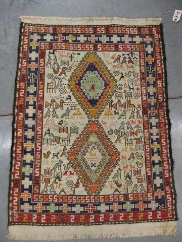 Appraisal: Tribal Handmade Rug animals geometrics ivory field ' x '