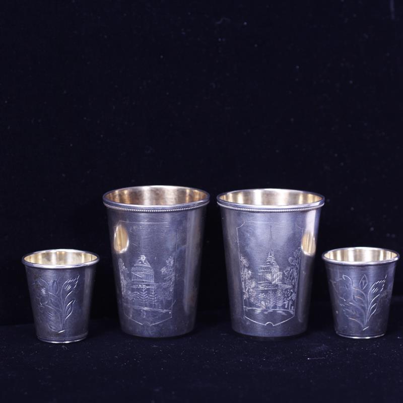 Appraisal: Four Russian Soviet Silver Beakers with engraved scenes Marked on