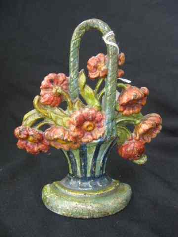 Appraisal: Cast Iron Figural Doorstop basket of flowers ''