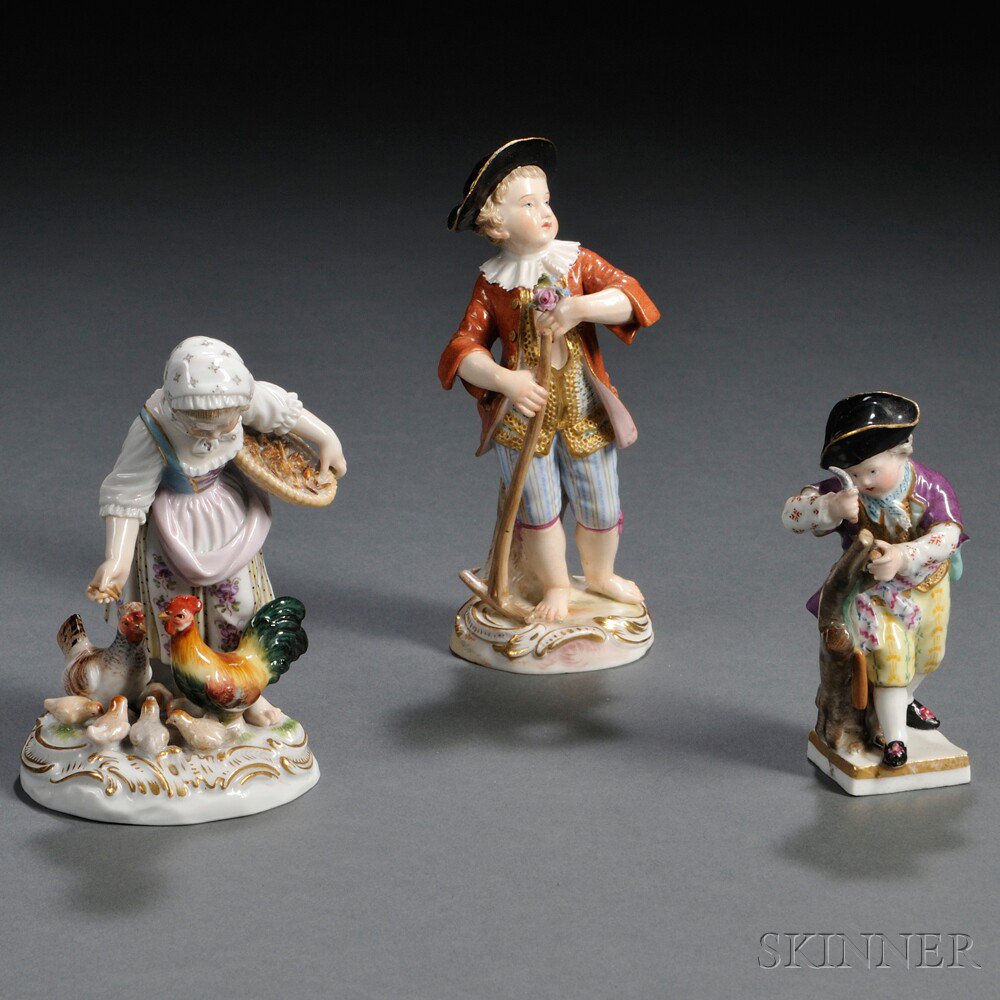 Appraisal: Three Meissen Porcelain Figures Germany th century each gilded and