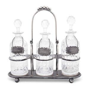 Appraisal: A Silver-Plate and Cut Glass Tantalus Thomas Otley and Sons