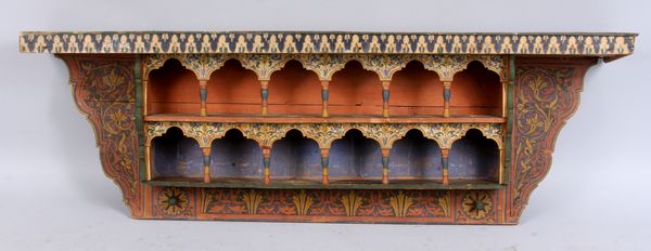 Appraisal: th Century Indonesian hand-painted wood shelf h x l x