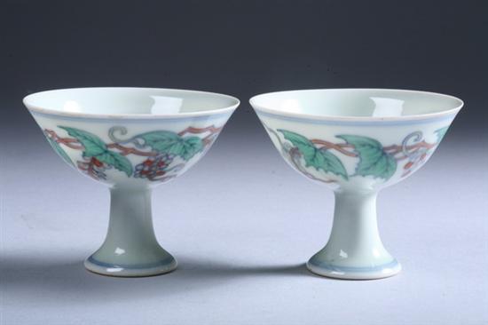 Appraisal: PAIR CHINESE DOUCAI PORCELAIN STEM CUPS Chenghua underglazed blue mark