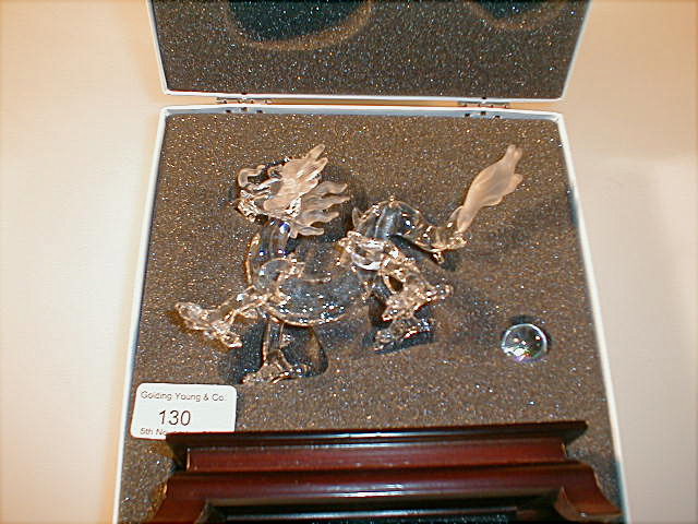 Appraisal: A Swarovski crystal model of a dragon with crystal ball