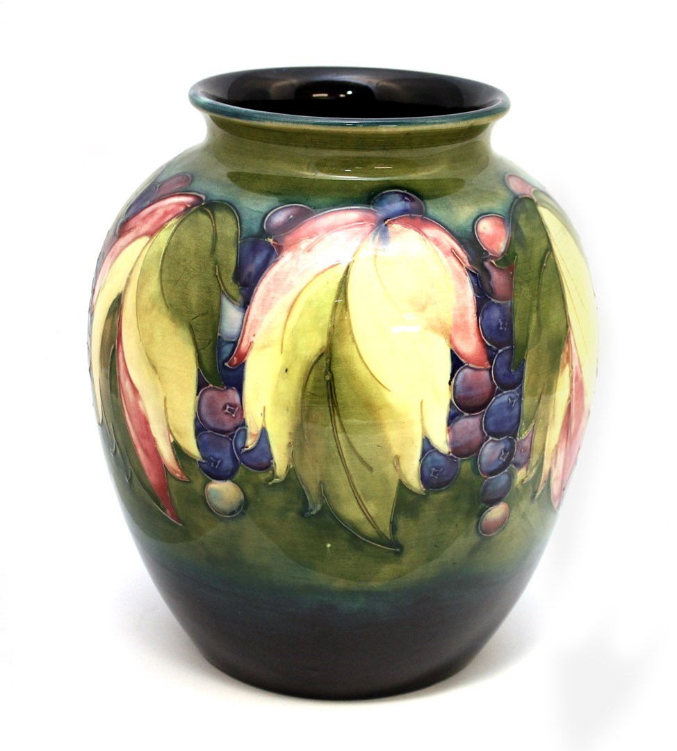 Appraisal: A Moorcroft vase decorated in the leaf grape pattern circa