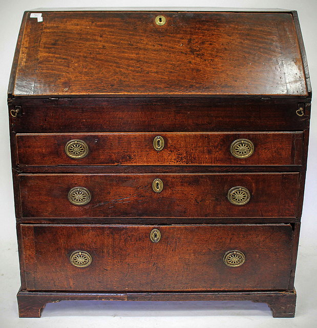 Appraisal: AN EARLY TH CENTURY BUREAU the fall front opening to