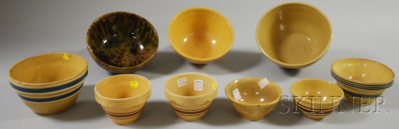 Appraisal: Eight Banded Yellowware Kitchen Bowls and a Glazed Sponge-decorated Yellowware