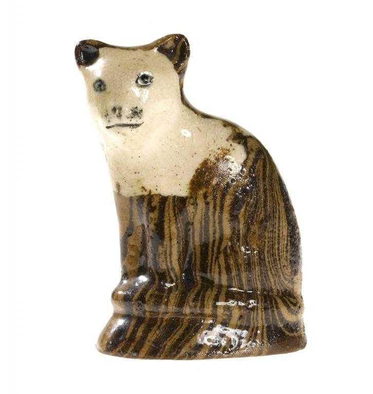 Appraisal: A STAFFORDSHIRE AGATEWARE MINIATURE MODEL OF A SEATED CAT on