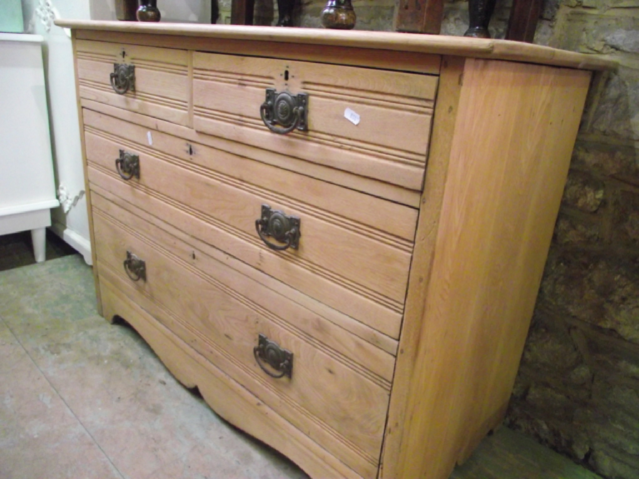 Appraisal: A stripped hardwood chest of two long and two short