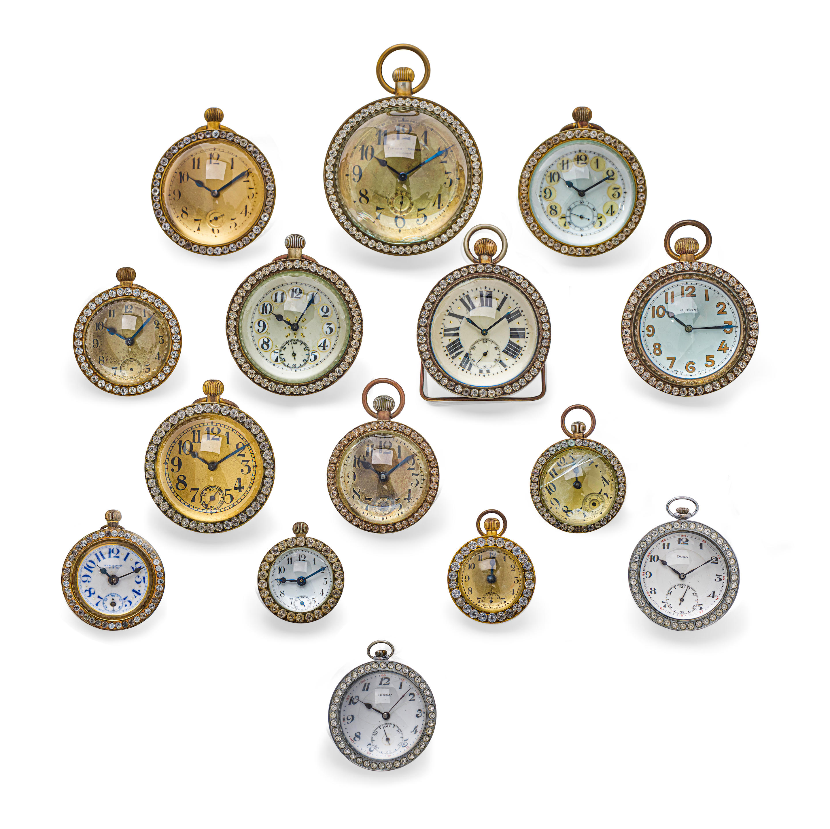 Appraisal: A GROUP OF SIXTEEN BALL CLOCKS Of varying sizes styles