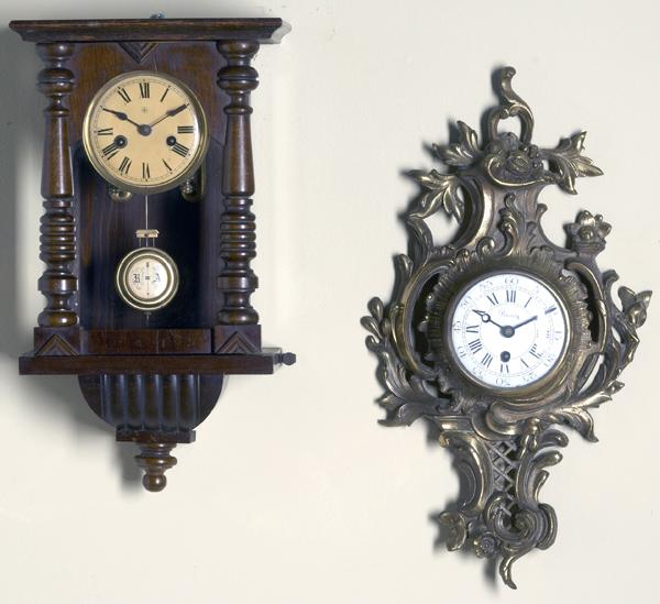 Appraisal: WALL CLOCKS French brass cartel clock signed Buney together with