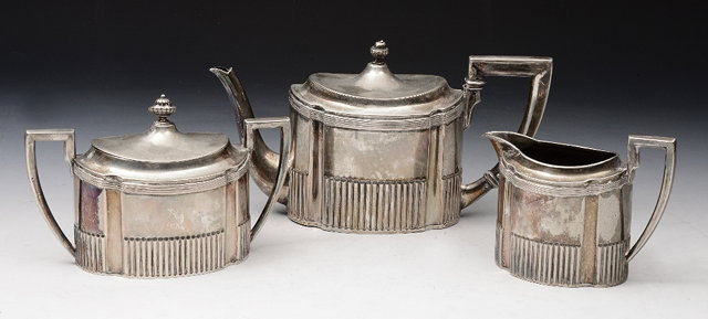 Appraisal: AN GRADE SILVER THREE PIECE TEA SET oval teapot with